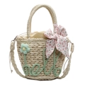 Beige hand-woven straw bucket bag with green flower embroidery and floral bow - Green