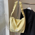 Minimalist bright yellow tote bag with ruched cloud-style strap and soft leather texture - Yellow - No Pendant