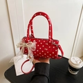Red polka dot cylinder handbag with lace bow and pearl charm strap in glossy finish - Red (With Pendant)
