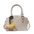 Minimalist creamy white bucket bag with pebble leather texture and cute elephant charm - With Pendant / Off White
