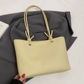 Borsa tote minimalista in ecopelle giallo crema con spalline annodate e patch di moda - Senza Ciondolo / Giallo
