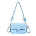 Light blue minimalist crossbody bag with textured leather and dual woven shoulder straps - Blue