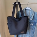 Minimalist black canvas tote bag with side pockets and a stylish leather logo patch - No Pendant / Black