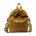 Versatile mustard yellow drawstring crossbody phone bag with adjustable woven straps - Quicksand Yellow
