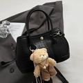 Minimalist black bucket bag with woven texture, leather handle and cute bear charm - Black With Bear Charm