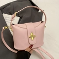 Pink lychee grain leather bucket bag with gold cross lock and adjustable crossbody strap - No Pendant / Pink