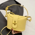 Chic bright yellow litchi pattern bucket bag with a gold twist lock and crossbody strap - No Pendant / Yellow