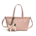 Pink lychee grain leather bucket bag with horse charm and adjustable strap - Milkshake Pink