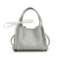 Borsa a secchiello in pelle martellata verde chiaro con fiocco in pizzo - Blu
