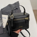 Classic black box-shaped crossbody bag with gold hardware and top handle for women - Black (Without Charm)