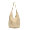 Minimalistische beige geweven tas met golvend haakpatroon en een brede schouderband - Beige