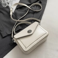 Creamy white oil wax leather crossbody bag with round metal turn lock and top handle - No Pendant / White