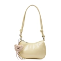 Pale yellow leather hobo bag with a plush bear charm and thin shoulder strap - Yellow