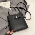 Minimalist black bucket bag in lychee pattern leather with metal buckle and shoulder strap - Black (No Pendant)