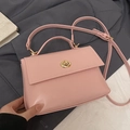Elegant light pink oil wax leather small square crossbody bag with gold rotating lock - Pink