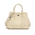 Mini cream litchi texture crossbody handbag with silver round metal buckle and handles - Off White
