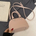 Zweifarbige rosa Muschel-Tasche aus strukturiertem Leder mit Griffen und Metallfüßen - Ohne Anhänger / Rosa