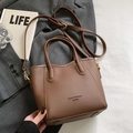 Minimalist brown lychee texture leather bucket bag with top handles and shoulder strap - Coffee Without Pendant