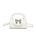 Chic white lychee leather crossbody bag with silver bow accent and top handle - White