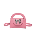 Chic pink bow mini handbag in pebble leather with silver butterfly detail and crossbody strap - Pink