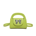 Light green faux leather mini handbag with a silver metallic bow and top handle - Green