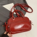 Glossy red faux leather Boston bag with silver hardware and adjustable shoulder strap - No Pendant / Red