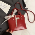Red glossy bucket bag with white lace bow and silver rivets, crossbody style - Red (No Pendant)