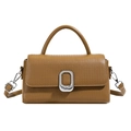 Caramel brown embossed leather handbag with silver rectangular buckle and adjustable strap - Brown