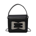 Mini bolso bandolera de cuero negro con hebilla de lazo plateada y correa de cadena - Negro