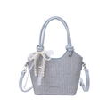 Blue and white woven bucket bag with pearl lace charm and detachable shoulder strap - Blue