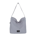 Minimalist light grey large capacity tote bag with long shoulder strap and brand label - Blue
