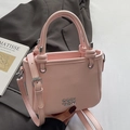Sac seau rose à texture litchi avec poignées nouées et logo en lettres métalliques argentées - Rose - Sans Pendentif
