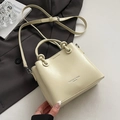 Sac seau minimaliste en cuir blanc cassé avec poignées et bandoulière réglable - Sans Pendentif / Jaune