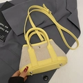 Mini borsa a secchiello in ecopelle gialla e tela beige intrecciata con piedini in argento - Giallo Piccolo (Senza Ciondolo)
