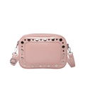 Pink crossbody bag with silver rivet studs and adjustable shoulder strap for women - Pink