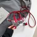 Mini borsa a mano trasparente con finiture in pelle rosso scuro e tracolla regolabile - Rosso