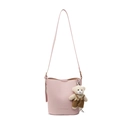 Pink lychee texture bucket bag with cute bear charm and adjustable shoulder strap - Pink With Bear Charm
