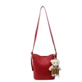 Red lychee texture bucket bag with adjustable strap and cute teddy bear pendant charm - Red With Bear Pendant