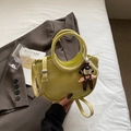 Lemon yellow crescent handbag with cute cartoon charm and white pearl chain detail - Yellow with Pendant