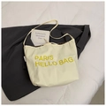 Beige Canvas-Tragetasche mit gelbem Paris-Aufdruck und braunem Karofutter innen - Gelb