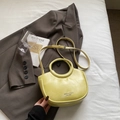Minimalist light yellow semicircular bucket bag with pearl finish and adjustable strap - Yellow Without Pendant