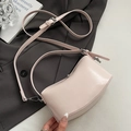 Chic light pink oil wax leather handbag with adjustable crossbody strap and silver hardware - No Pendant / Pink