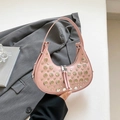Pink crescent hobo bag featuring stylish silver metal studs and a top zipper closure - Pink