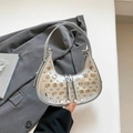 Silver hobo bucket bag with metallic rivets and a stylish crescent moon shape for women - Silver