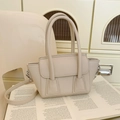 Elegante borsa a secchiello beige con trama a grana, manici e tracolla regolabile - Bianco Sporco