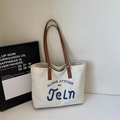 Borsa tote in tela bianco sporco con manici marroni e ricamo blu in rilievo - Bianco Sporco