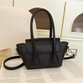 Fashionable black lychee textured hobo bag with top handles and silver hardware - Black