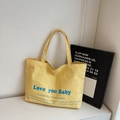 Minimalist yellow canvas tote bag featuring navy Love You Baby print and large capacity - Yellow