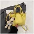 Yellow litchi pattern bucket bag with cute dog pendant and adjustable shoulder strap - Yellow with Pendant