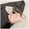 Chic light pink lychee leather bucket bag with knotted handle and adjustable strap - Pink Without Pendant